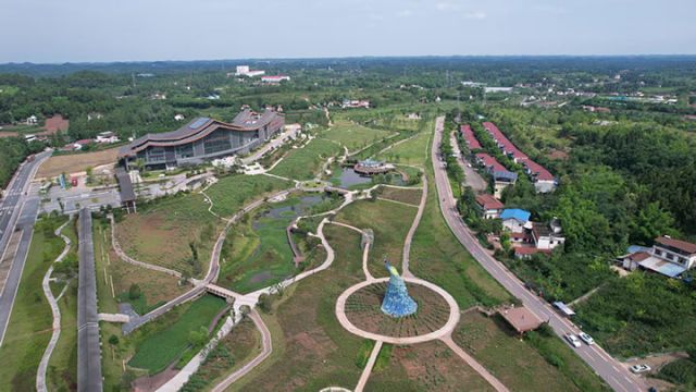 图1  孔雀花乡.jpg