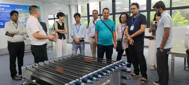 1762853814340225.jpg 图5 国际山地组织代表团访华交流,共探全钒液流电池。(华泸集团供图).jpg