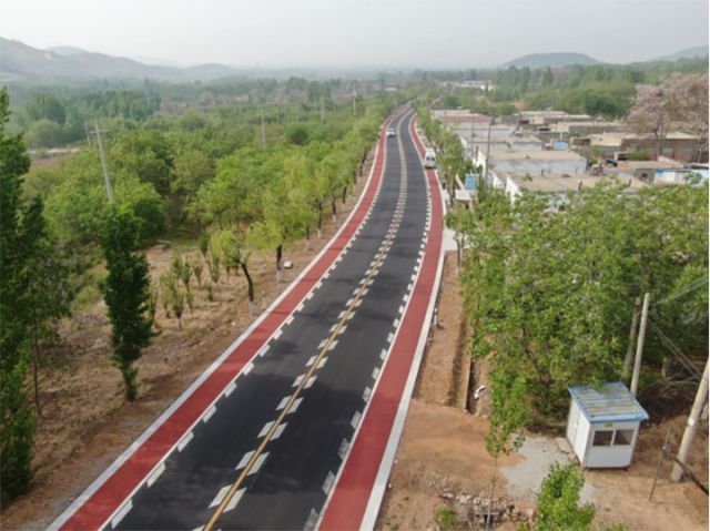 1764063006904630.jpg 图1 路绕村转 (田雪 摄) 拷贝.jpg